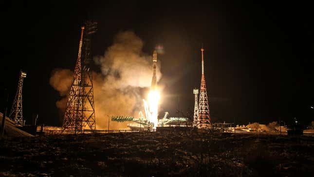A Soyuz-2.1B rocket booster with a Fregat upper stage lifts off from the Baikonur Cosmodrome to deliver into orbit 36 British OneWeb satellites.