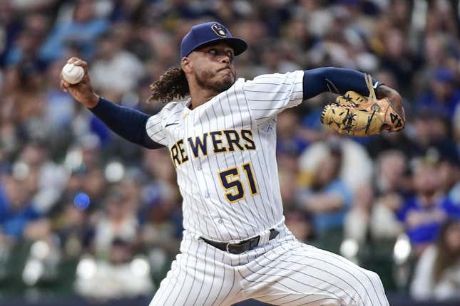 Aug 26, 2023; Milwaukee, Wisconsin, USA; Milwaukee Brewers pitcher Freddy Peralta (51) pitches against the San Diego Padres in the first inning at American Family Field.