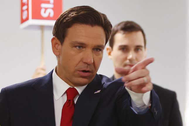 Florida Governor Ron DeSantis gestures as he speaks in the Spin Room following the first Republican Presidential primary debate at the Fiserv Forum in Milwaukee, Wisconsin, on August 23, 2023.