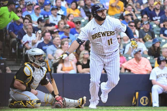Jun 17, 2023; Milwaukee, Wisconsin, USA; Milwaukee Brewers first baseman Rowdy Tellez (11) hits a double to drive in two runs against the Pittsburgh Pirates in the fifth inning at American Family Field.