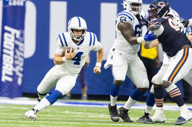 Aug 19, 2023; Indianapolis, Indiana, USA; Indianapolis Colts quarterback Sam Ehlinger (4) runs the ball in the second quarter against the Chicago Bears at Lucas Oil Stadium.