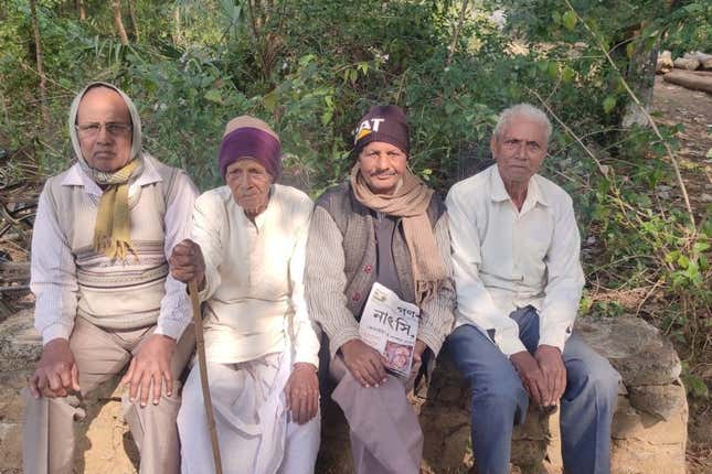 Committee members representing the villages for plantation on the barren mountain.