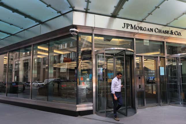 A man walks out of the turnstile exiting the JPMorgan Chase headquarters building in Manhattan.