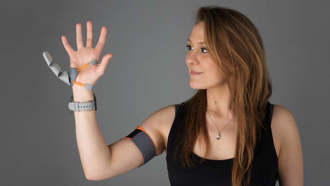 UCL designer Dani Clode with her ‘Third Thumb’ device.