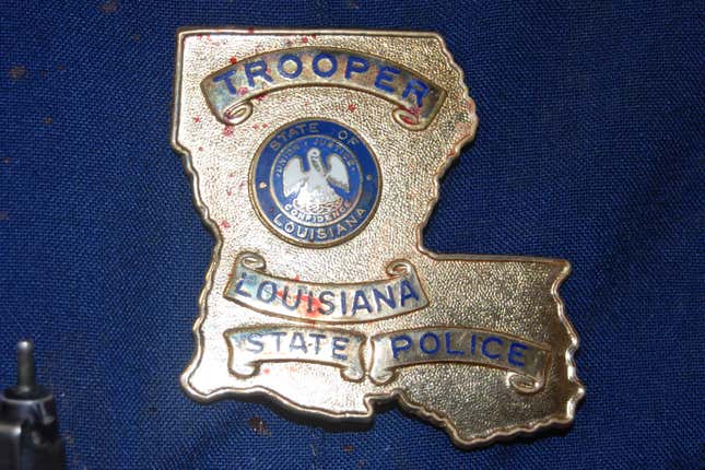 This May 10, 2019 photo provided by the Louisiana State Police shows blood stains on the shield and uniform of Master Trooper Chris Hollingsworth, in West Monroe, La., after troopers punched, dragged and stunned Black motorist Ronald Greene during his fatal 2019 arrest. 