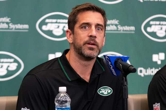 Apr 26, 2023; Florham Park, NJ, USA; New York Jets quarterback Aaron Rodgers (8) answers questions during the introductory press conference at Atlantic Health Jets Training Center.