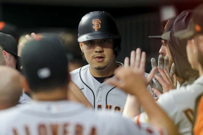 Wilmer Flores hit 2 more HRs as Giants outlast Reds 11-10