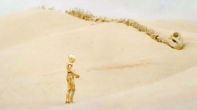 C-3PO wanders past the skeletal remains of a Krayt Dragon into the deserts of Tatooine in Star Wars: A New Hope.
