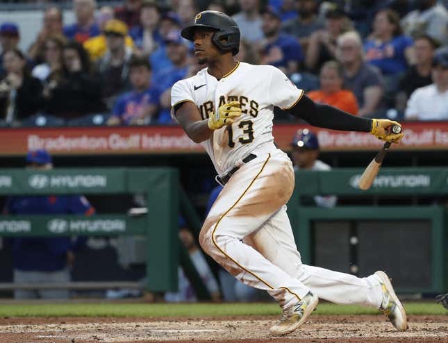 Jun 9, 2023; Pittsburgh, Pennsylvania, USA; Pittsburgh Pirates third baseman Ke'Bryan Hayes (13) hits a two run double against the New York Mets during the fourth inning at PNC Park.