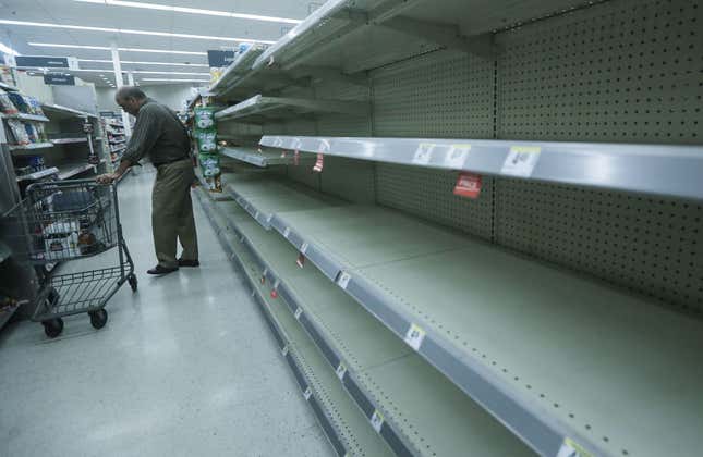 Beverage shelves stand mostly empty in a Walgreens store over three weeks after Hurricane Maria hit the island, on October 13, 2017 in San Juan, Puerto Rico.