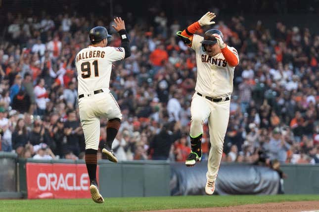 Sep 10, 2023; San Francisco, California, USA;  San Francisco Giants designated hitter Joc Pederson (23) celebrates with third base coach Mark Hallberg (91) after hitting a solo home run during the fifth inning against the Colorado Rockies at Oracle Park.