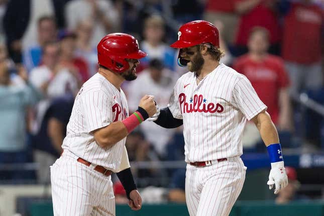 Aug 8, 2023; Philadelphia, Pennsylvania, USA; Philadelphia Phillies designated hitter Bryce Harper (3) celebrates with left fielder Kyle Schwarber (12) after hitting a two RBI home run fifth inning against the Washington Nationals at Citizens Bank Park.
