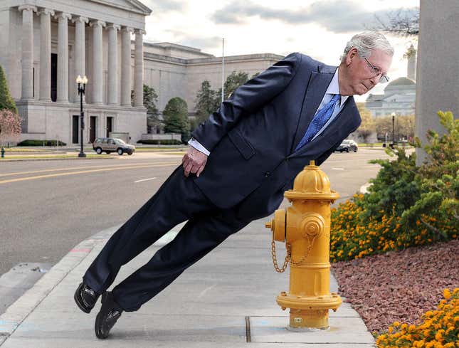 Image for article titled Staffer Waiting For Car Temporarily Leans Frozen Mitch McConnell Against Nearby Fire Hydrant