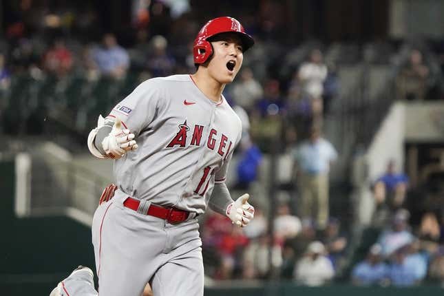 Jun 12, 2023; Arlington, Texas, USA; Los Angeles Angels designated hitter Shohei Ohtani (17) reacts as he rounds the bases after hitting a two run go ahead home run during the twelfth inning against the Texas Rangers at Globe Life Field.