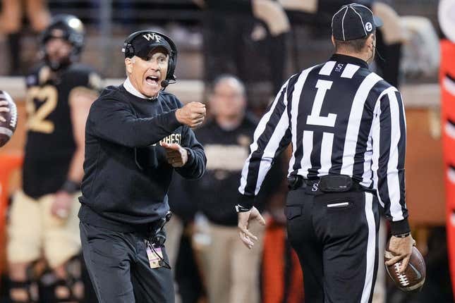 Nov 12, 2022; Winston-Salem, North Carolina, USA;  Wake Forest Demon Deacons head coach Dave Clawson calls out to an official during the second half against the North Carolina Tar Heels at Truist Field.