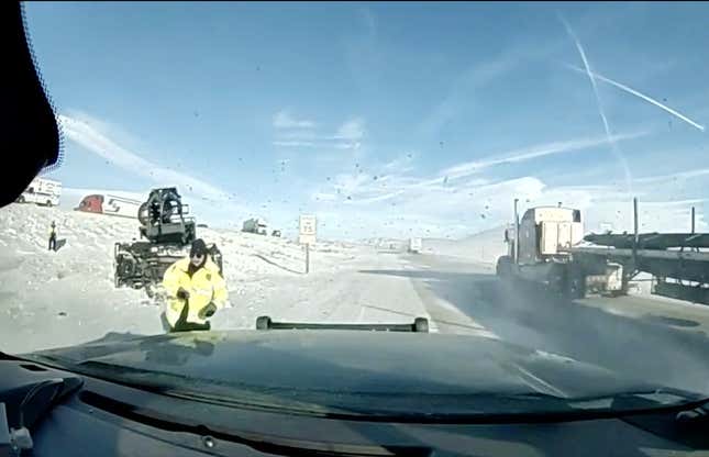 Image for article titled State Trooper Barely Avoids Out-Of-Control Big Rig After Wyoming Blizzard