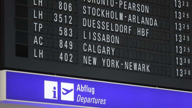 A departures board at an airport in Germany 