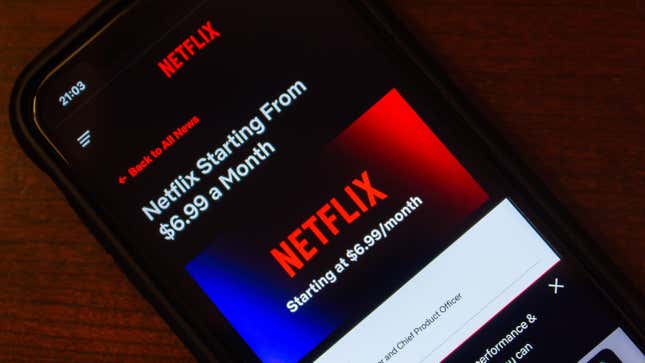 A phone with the Netflix site and the news bulletin that Netflix starting from 6.99 a month.
