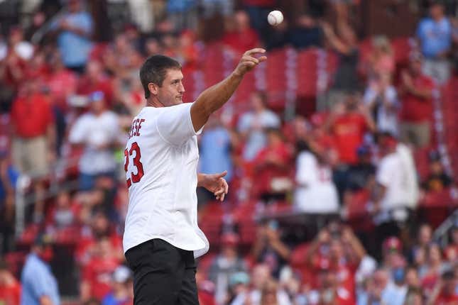 Aug 17, 2021; St. Louis, Missouri, USA; Former St. Louis Cardinals third baseman David Freese and 2011 NLCS and World Series MVP throws out a first pitch prior to a game against the Milwaukee Brewers at Busch Stadium.