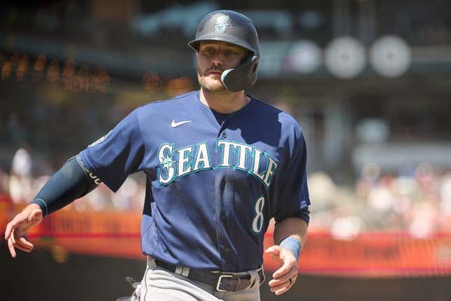 Jul 4, 2023; San Francisco, California, USA; Seattle Mariners designated hitter AJ Pollock (8) scores a run against the San Francisco Giants during the sixth inning at Oracle Park.