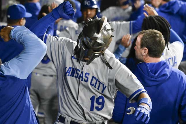 Sep 12, 2023; Chicago, Illinois, USA; Kansas City Royals second baseman Michael Massey (19) celebrates in the dugout  after hitting a three run home run against the Chicago White Sox during the second inning at Guaranteed Rate Field.