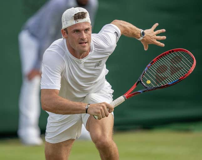Jul 8, 2023; London, United Kingdom; Tommy Paul (USA) runs for the ball during his match against Jiri Lehecka (CZE) on day six at the All England Lawn Tennis and Croquet Club.