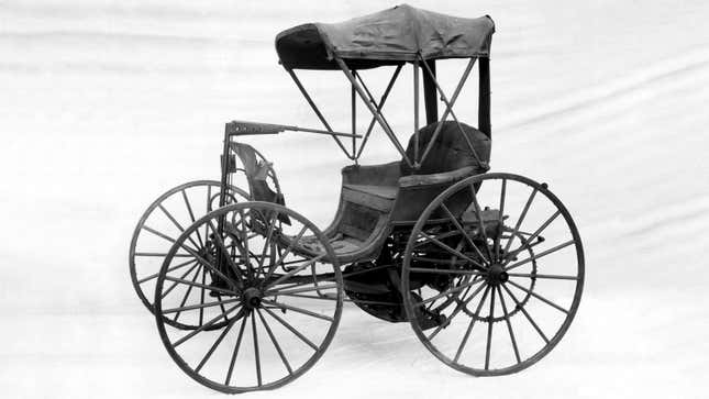 A black and white image of a Duryea Motor Wagon. 