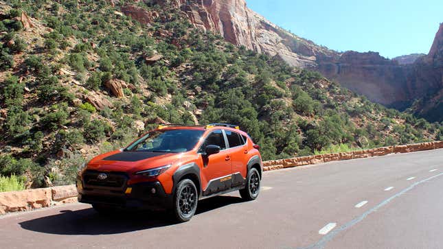 A photo of a Subaru Crosstrek Wilderness in a national park. 