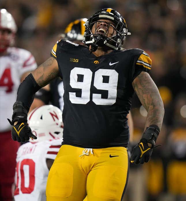 Iowa defensive lineman Noah Shannon (99) reacts after tackling Nebraska running back Anthony Grant for a loss of yards in the fourth quarter during a NCAA football game on Friday, Nov. 25, 2022, at Kinnick Stadium in Iowa City.

Iowavsneb 20221125 Bh