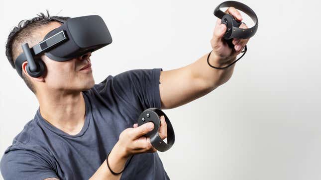 Man playing VR using a Oculus Rift.
