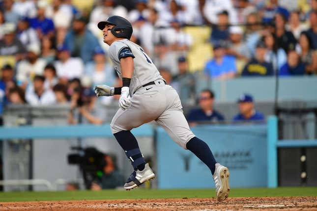 Jun 4, 2023; Los Angeles, California, USA; New York Yankees shortstop Anthony Volpe (11) hits a two run home run against the Los Angeles Dodgers during the ninth inning at Dodger Stadium.