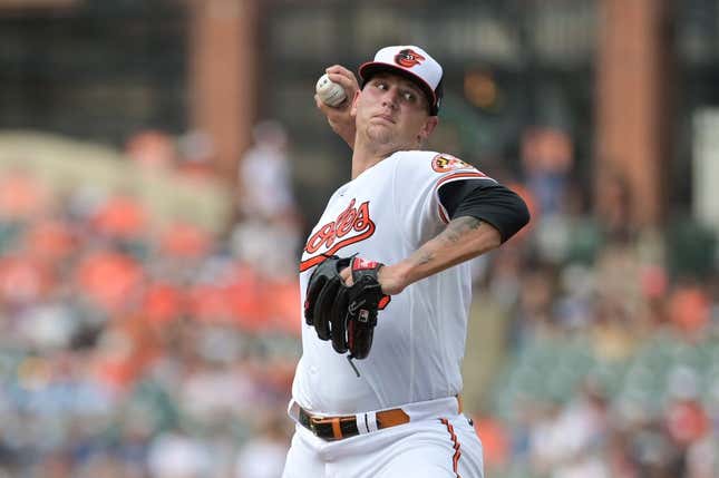 Jun 27, 2023; Baltimore, Maryland, USA;  Baltimore Orioles starting pitcher Tyler Wells (68) throws a first inning pitch against the Cincinnati Reds at Oriole Park at Camden Yards.