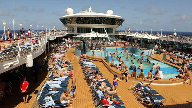 The main swimming pool area is seen on the top deck July 13, 2013 aboard the Royal Caribbean cruise ship 'Grandeur of the Seas' en route to Hamilton, Bermuda. REUTERS/Gary Cameron