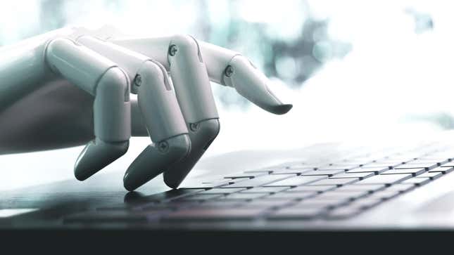 Stock image of robot hand typing