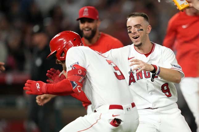 Jul 15, 2023; Anaheim, California, USA; Los Angeles Angels left fielder Taylor Ward (3) celebrates with shortstop Zach Neto (9) after hitting a fielder choice ground ball in the 10th inning to drive in the winning run against the Houston Astros at Angel Stadium.