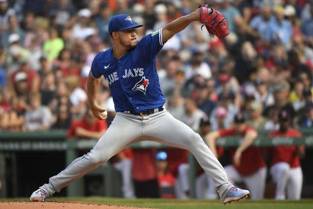 Aug 5, 2023; Boston, Massachusetts, USA;  Toronto Blue Jays starting pitcher Jose Berrios (17) pitches during the first inning against the Boston Red Sox at Fenway Park.