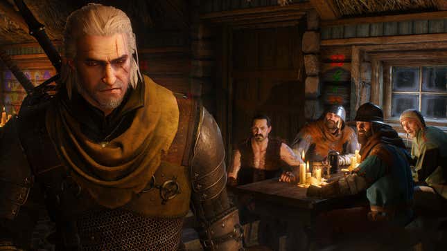 Geralt standing in a pub while a group of men look on.