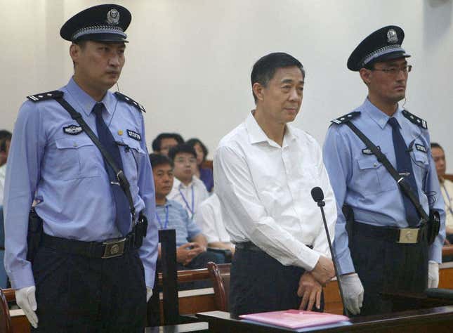 The Jinan Intermediate People&#039;s Court&#039;s website carries a photo of former Chinese Communist Party rising star Bo Xilai standing trial on charges of taking bribes, embezzlement and abuse of power at the court in Shandong Province on Aug. 22, 2013. (Kyodo via AP Images