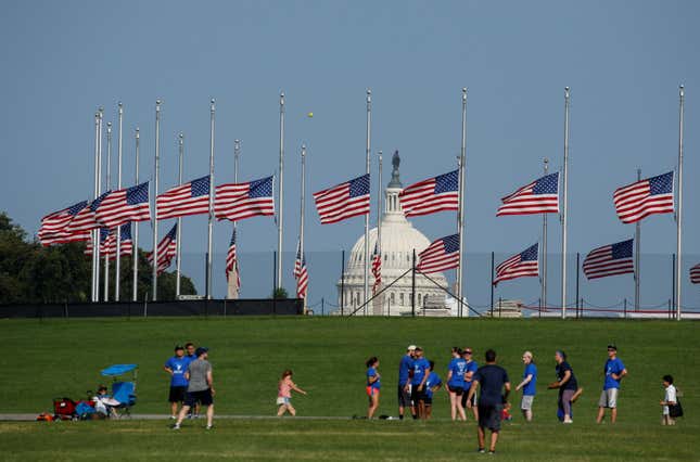 Flags in front of the Washington Monument are lowered for Senator McCain’s death.