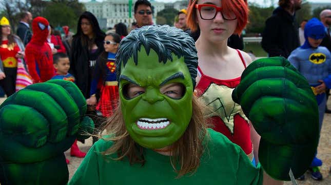 Kid in Hulk mask and gloves