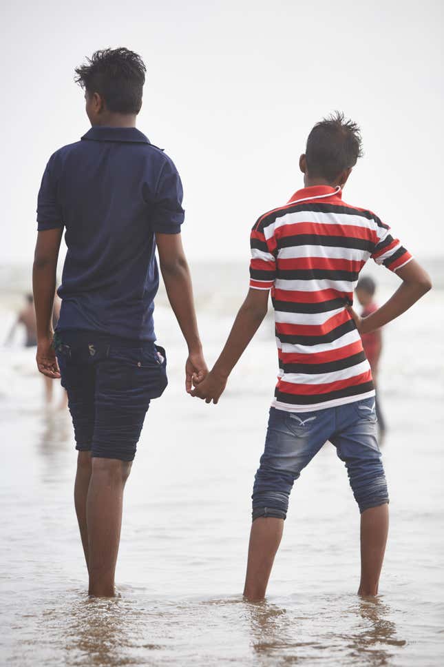 Image for article titled A photo series captures Indian men and their love for holding hands