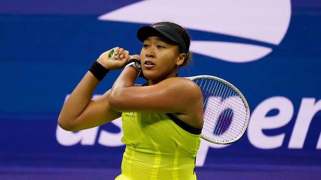 Naomi Osaka, of Japan, returns a shot to Leylah Fernandez, of Canada, during the third round of the US Open tennis championships, Friday, Sept. 3, 2021, in New York.