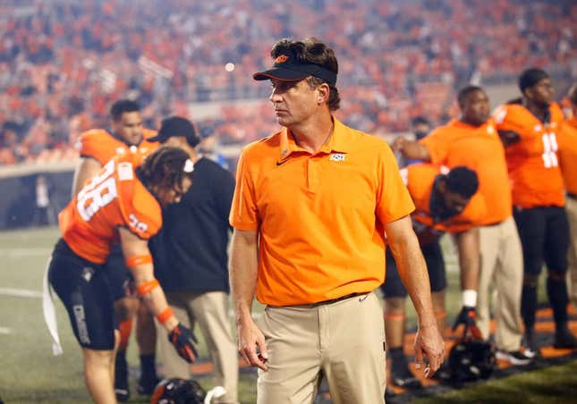 Oklahoma Sate football coach Mike Gundy waits to sing the alma mater following the college football game between Oklahoma State University Cowboys (OSU) and Baylor University Bears at Boone Pickens Stadium in Stillwater, Okla., Saturday, Oct. 2, 2021. OSU won 24-17.

gundy cover cutout