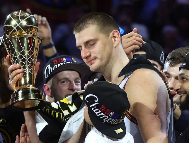 Image for article titled Nikola Jokic Fast Asleep Seconds After Being Handed Championship Trophy