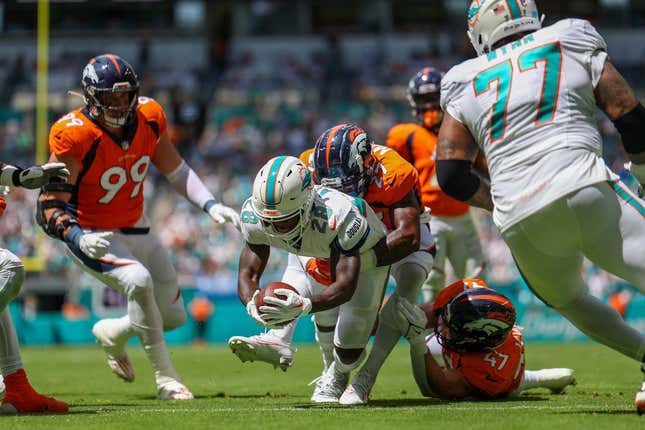 Dolphins rout Broncos 70-20, scoring the most points by an NFL