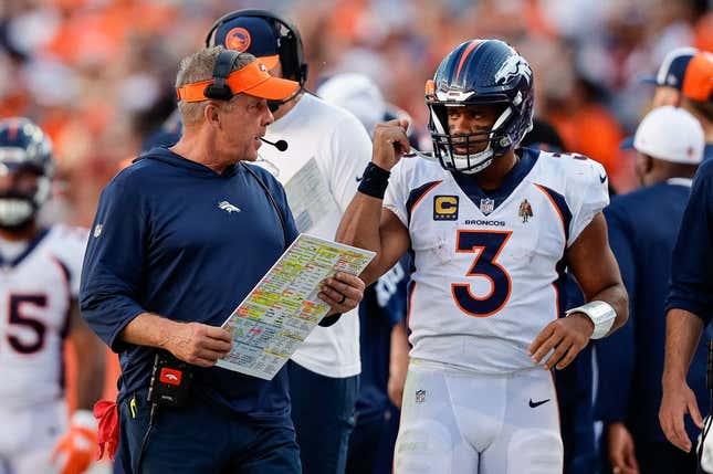 Sep 17, 2023; Denver, Colorado, USA; Denver Broncos head coach Sean Payton talks with quarterback Russell Wilson (3) in the fourth quarter against the Washington Commanders at Empower Field at Mile High.