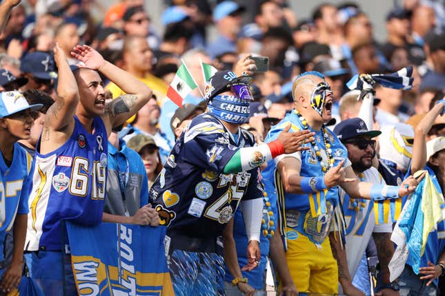 Chargers fans look on aghast as Dallas wins on a 56-yard field goal.