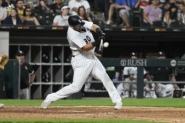 Jul 27, 2023; Chicago, Illinois, USA; Chicago White Sox third baseman Jake Burger (30) hits a two-run home run against the Cleveland Guardians during the fifth inning at Guaranteed Rate Field.