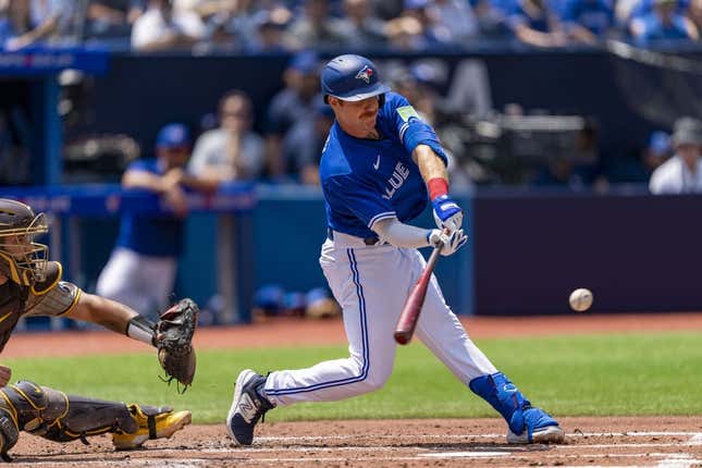 Jul 20, 2023; Toronto, Ontario, CAN; Toronto Blue Jays left fielder Jordan Luplow (7) hits a RBI single against the San Diego Padres during the second inning at Rogers Centre.