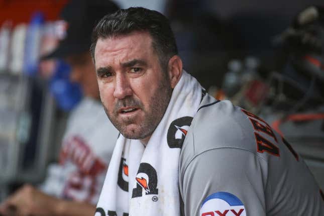 Aug 5, 2023; Bronx, New York, USA;  Houston Astros starting pitcher Justin Verlander (35) sits in the dugout in the sixth inning against the New York Yankees at Yankee Stadium.